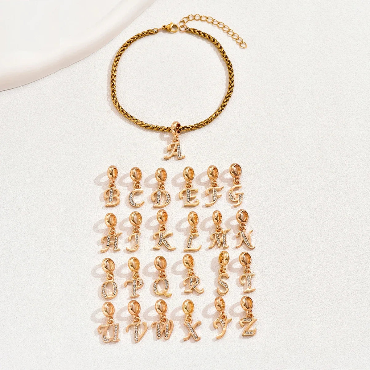 Savaé Design Initial Charm Bracelet in Gold and Silver