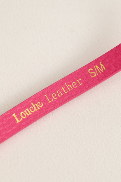 close up The Louche Amira Sleek Belt in Pink
